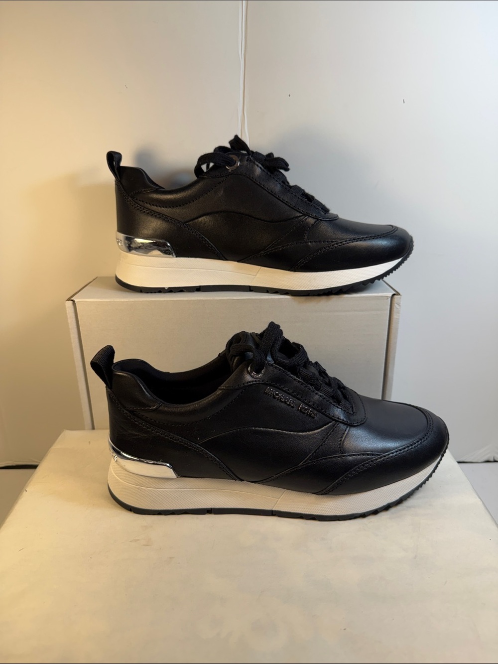 Michael Kors Black Leather Low-Top Platform Sneakers with Silver Heel Accent